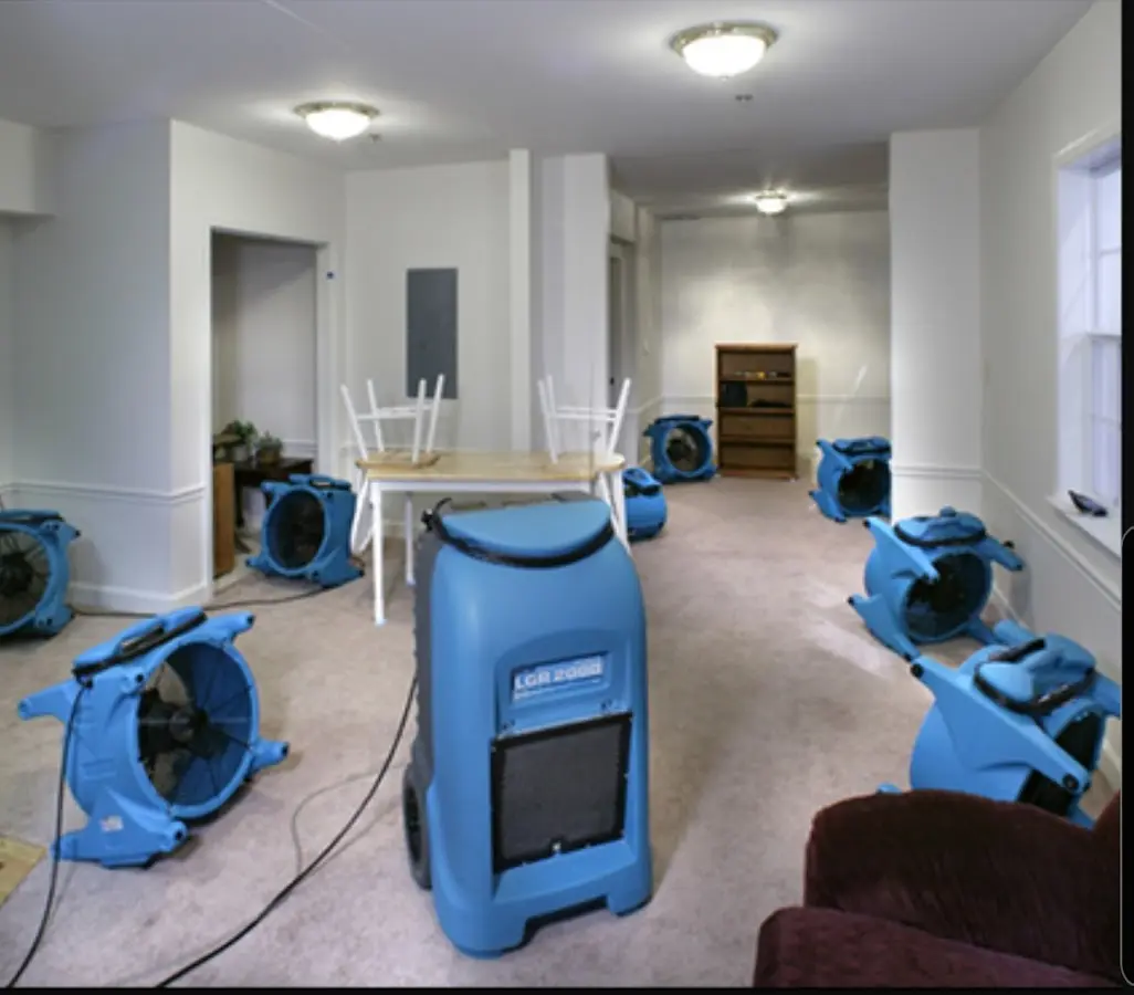 Air movers and dehumidifier setup for Water Damage Restoration in Spirit Lake
