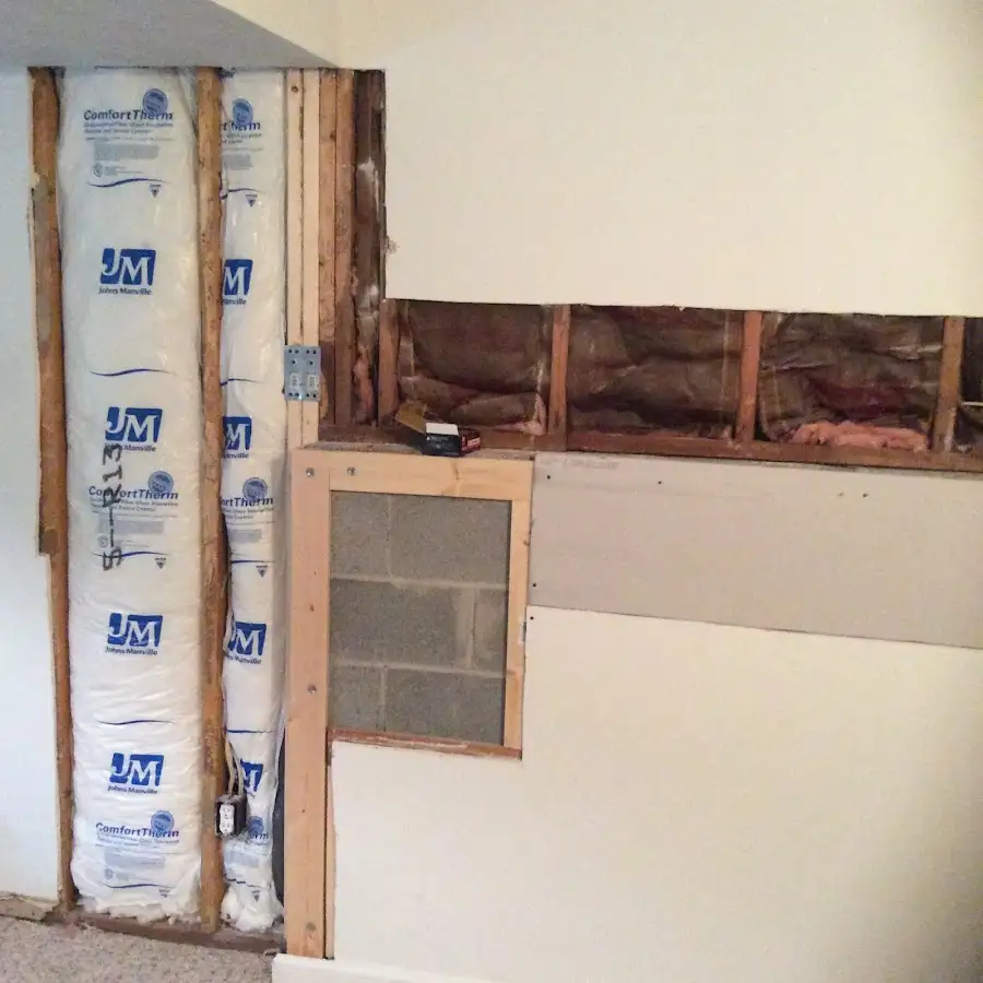 Wall insulation replacement during Structural Drying in Spirit Lake